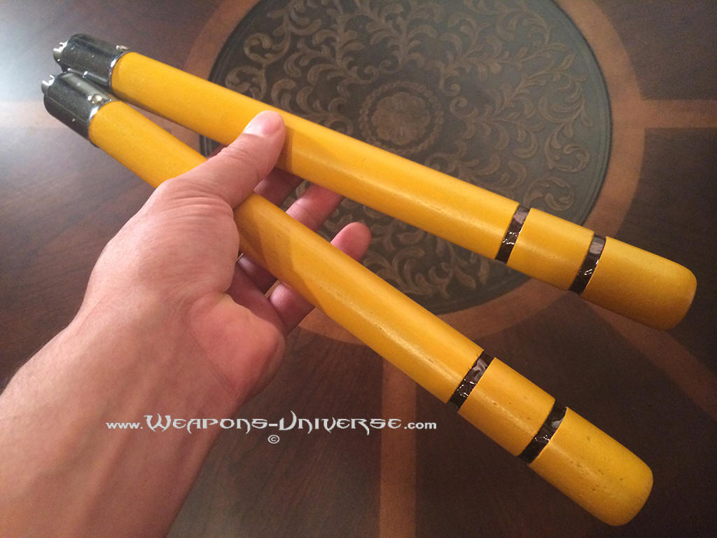 bruce lee yellow nunchucks